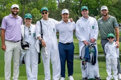 Actor Ryu Jun yeol caddies for golfer Kim Joo hyung at The Masters Par 3 Contest