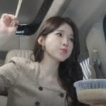Kang Min kyung Draws Criticism for Not Wearing Seatbelt in Car Vlog